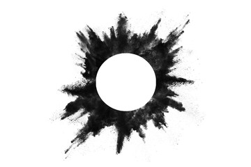 Particles of charcoal on white background,abstract powder splatted on white background,Freeze motion of black powder exploding or throwing black powder.