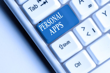 Text sign showing Personal Apps. Business photo text Organizer Online Calendar Private Information Data White pc keyboard with empty note paper above white background key copy space