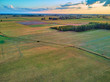 © udmurd - Beautiful panoramic aerial drone view to view of fields in eastern Poland at sunset, near Bialowieza Forest - near of the last and largest remaining parts of the immense primeval european forest