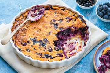 Wall Mural - Lemon, blueberry and blackberry clafoutis - delicious baked fruit dessert