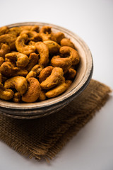 Wall Mural - Kaju Pakoda/pakora OR Cashew Nut Fritters or bhajji, is a tasty snack from India, served as Chakna