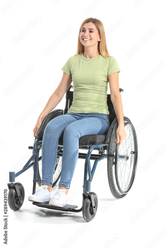 Beautiful woman in wheelchair on white background