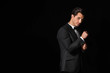 © Pixel-Shot - Fashionable man in formal clothes on dark background