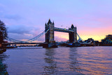 Fototapeta Londyn - Beautiful sunset on the river Thames at Tower Bridge with reflection light on the river.