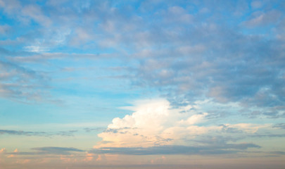 Wall Mural - Dramatic sun ray with orange sky and clouds dawn texture background