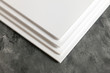© jose_feito - white cardboard sheets stacked