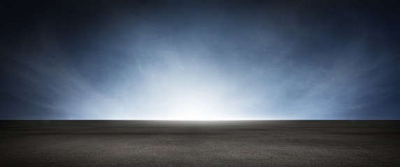 Wall Mural - dark concrete floor background with dramatic atmospheric sky