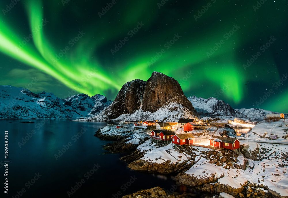 Aurora borealis over Hamnoy in Norway - obrazy, fototapety, plakaty 