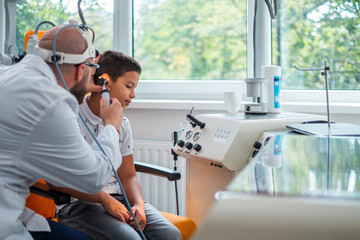 Boy at check-up at otolaryngologist