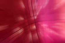 Abstract Background Of Colorful Lighting Speed Effect With Colorful Shades Of Pink Color.