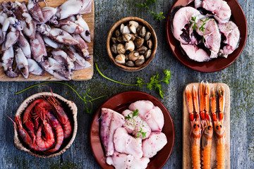 Wall Mural - assortment of raw seafood on a table