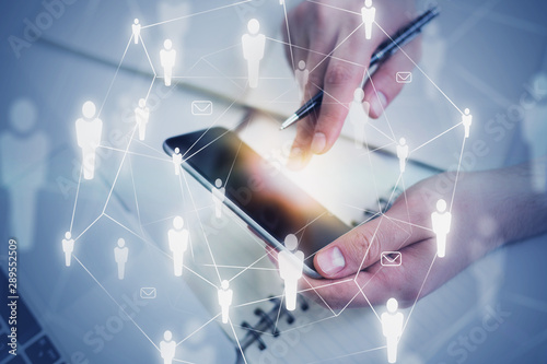 Cuadros en Lienzo Man using smartphone, social network interface
