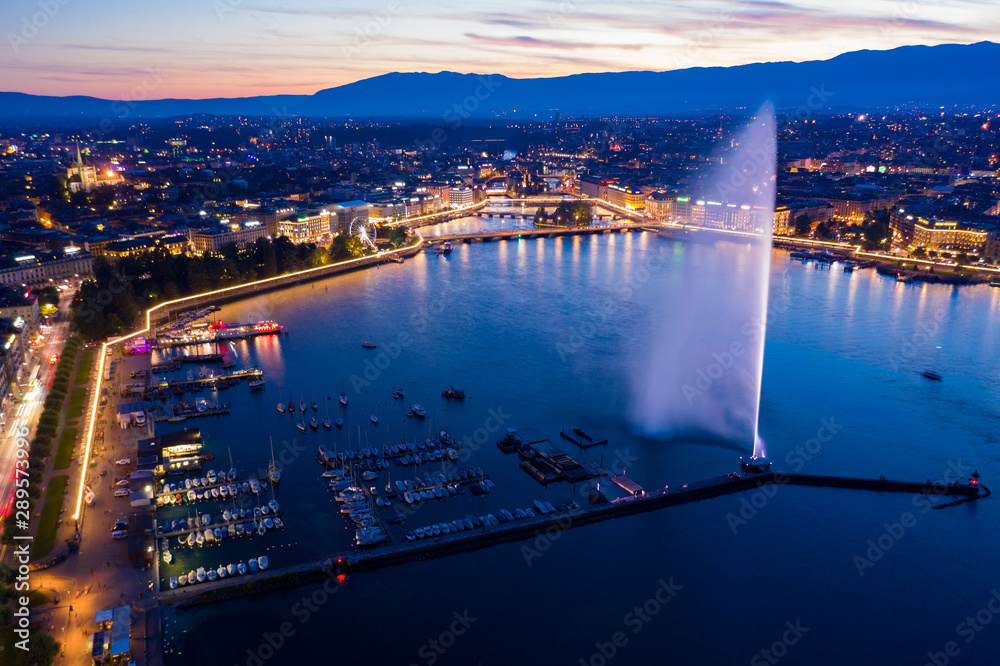 Aerial  night view of Geneva city water fountain in Switzerland - obrazy, fototapety, plakaty 