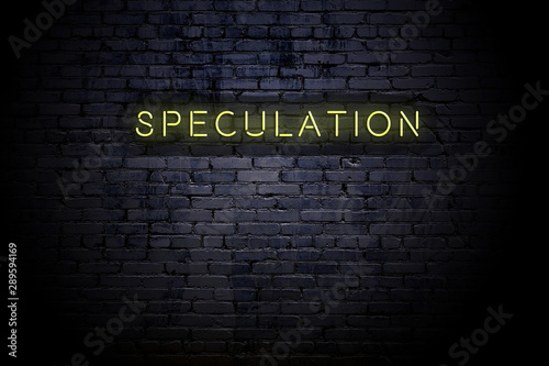 Fotomural Highlighted brick wall with neon inscription speculation