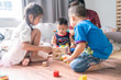 © themorningglory - Group of lottle kid friend playing toy together