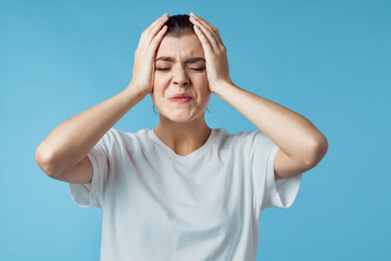 Wall Mural - young woman with headache