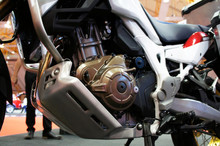Selective Focused On A High Performance Motorcycle Engine. The Engine Is Installed On A Designed Motorcycle Chassis.  