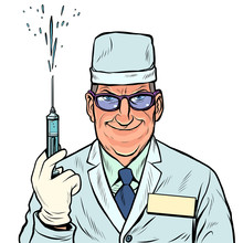 Doctor Man With A Syringe. Vaccination And Injection