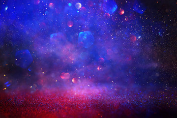 Wall Mural - abstract glitter silver, purple, blue and gold lights background. de-focused