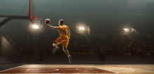 Basketball Player On Basketball Court In Action. Slam Dunk. Jump Shot
