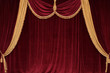 © zinovskaya - Scarlet velvet curtains with lambrequin and gold fringe in vintage style