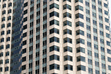 Wall Mural - close up on facade view of glass windows in office building