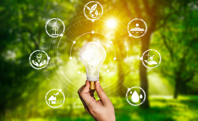 green energy innovation light bulb with future industry of power generation icon graphic interface. 