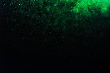 Wall Mural - abstract green bokeh defocus glitter blur background.