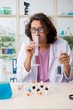 © Elnur - Funny male chemist working in the lab