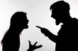 © satura_ - Aggression and abuse concept - man and woman expressing domestic violence in studio silhouette isolated on white background.