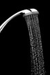 © Love the wind - Water drops flowing from shower head in bathroom on black background ,stop motion