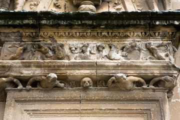  Decoration of figures in stone on a pilaster of the main facade of the chapel of El Salvador, renaissance style, Ubeda, Jaen province, Spain