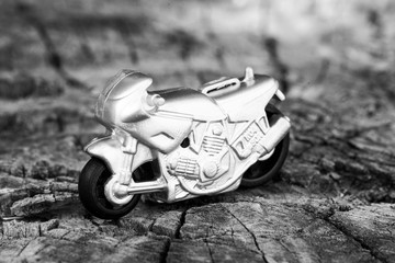 Wall Mural - Small toy gray sports bike.