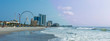 © Wollwerth Imagery - Panoramic view of Myrtle Beach, South Carolina with beach, hotels, ferris wheel, and boardwalk.
