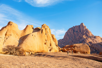 Wall Mural - Kids hiking in Spitzkoppe Namibia