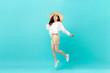© Atstock Productions - Studio shot of happy energetic asian woman wearing casual clothes jumping
