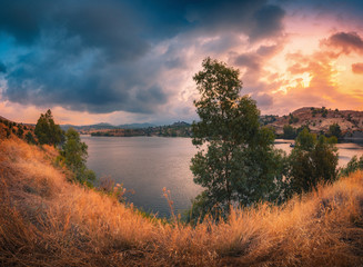 Wall Mural - Tamassos Reservoir (water dam) in Nicosia area, Cyprus on a sunset