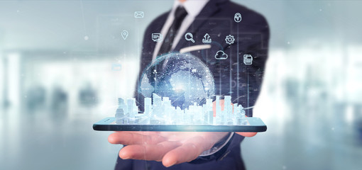 Poster - Businessman holding Smart city user interface with icon, stats and data 3d rendering