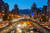 Fototapeta  - 06/05/2019 Tehran,Iran,Famous night view of Tehran,Flow of traffic round Tohid Tunnel with Milad Tower and Alborz Mountains in Background, Tohid Tunnel one of longest urban tunnel in Middle East