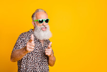 Portrait Of Funky Old Bearded Man In Eyeglasses Eyewear Feel Cool Crazy Point At You Wearing Leopard Shirt Isolated Over Yellow Background