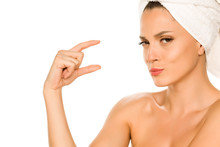 Young Beautiful Advertizing Woman With Towel On Her Head On White Background