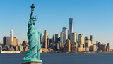 Fototapeta  - The Statue of Liberty over Scene of New York cityscape river side which location is lower manhattan which can see One world trade conter, United state of America, USA, Taking from New Jersey skyline