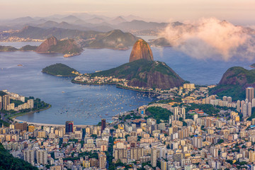 Fototapete - The mountain Sugarloaf and Botafogo in Rio de Janeiro at sunset, Brazil