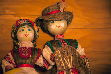 handmade doll wooden background 