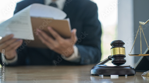 Fotografía Justice and law concept.Male judge in a courtroom with the gavel