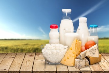 Canvas Print - Glass of milk and bottle on  background