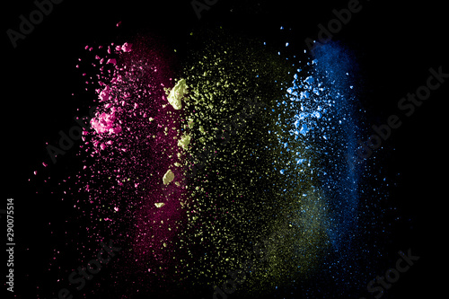 Abstract colorful dust particles textured background.Multicolored powder expl...