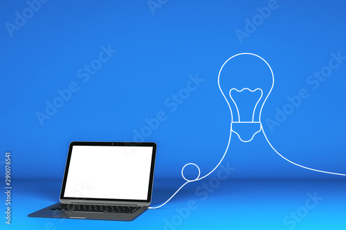 Idea concept with blank white mock up laptop monitor and wire light bulb at b...