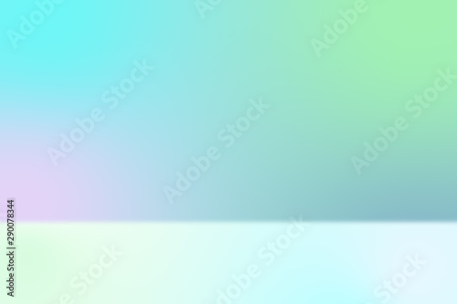 Astract spacious hall with gradient wall in pastel shades and light green floor.