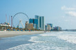 Resorts, ocean, and ferris wheel in Myrtle Beach, South Carolina.